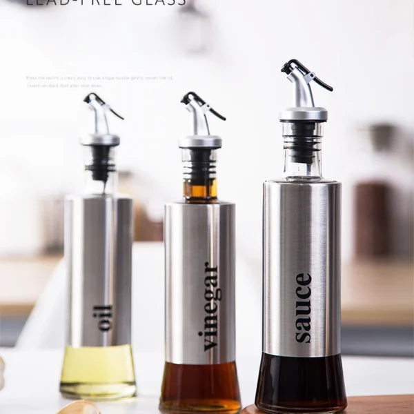 Wholesale China Kitchen Gadget Stainless Steel Layer Olive Essential Oil Glass Dispenser Bottle